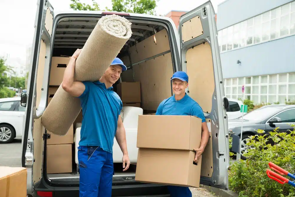 hired movers loading boxes into a rental truck