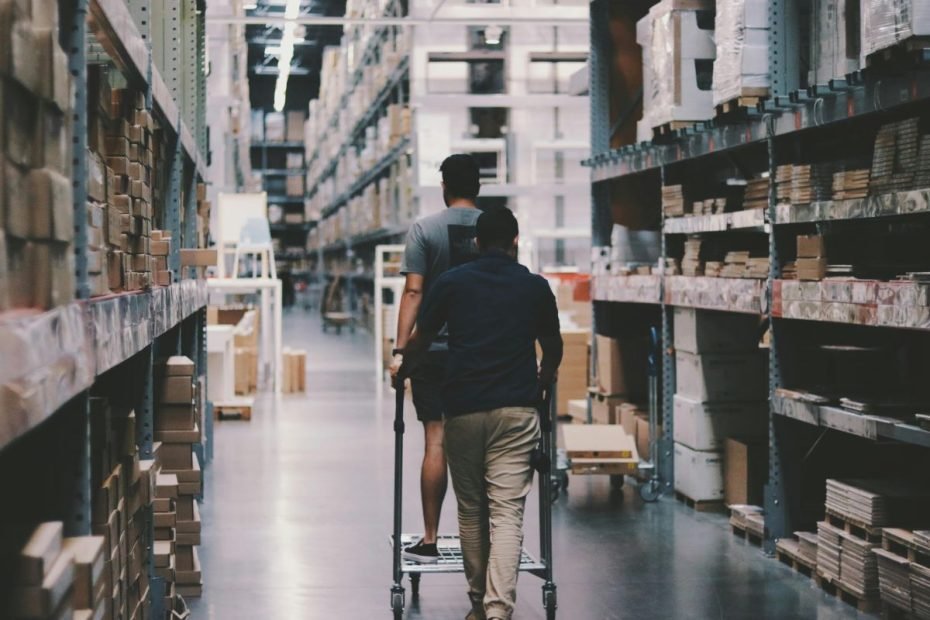 Two men working in a warehouse