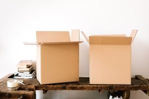 Moving boxes on a table