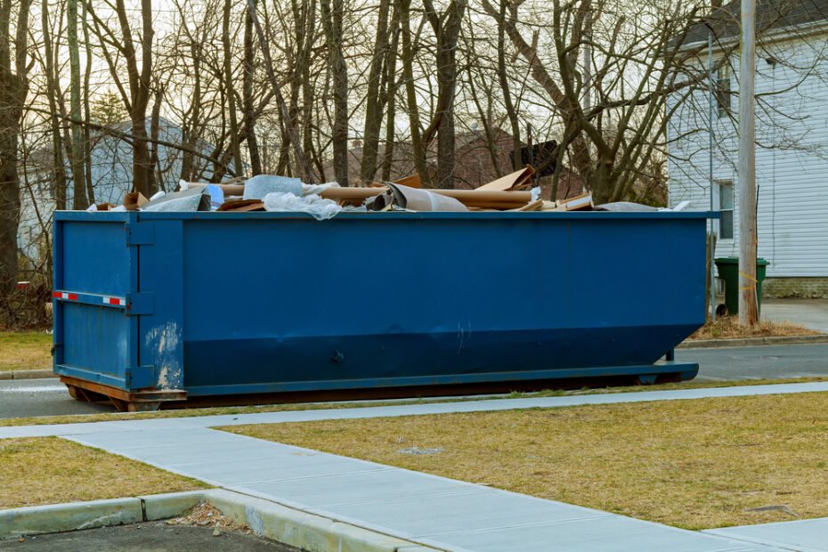 dumpster in driveway